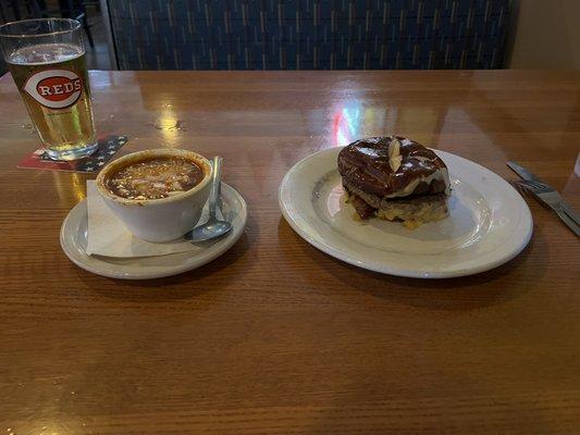 Burger of the week. Beef patty, sautéed onions, beer cheese on a pretzel bun