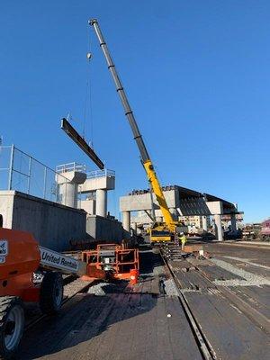 Setting bridge spans wtih our 275 ton crane.