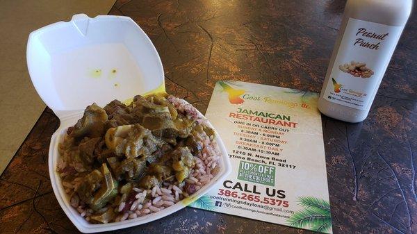 Jamaican curried goat with rice and beans and peanut punch.