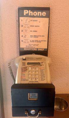 Pay Phone with Ash Tray.  Blast from the past!