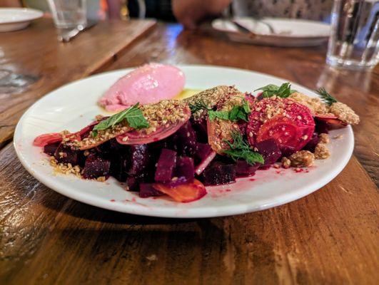 Remolacha. $14. Beet goat cheese mousse, spring onion, citrus roasted beets, benne brittle.