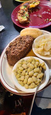 Meatloaf, lima beans, and stewed cabbage.