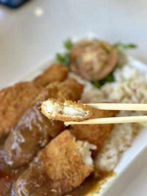 The batter of the fish katsu is crispy and the inside is tender and flaky