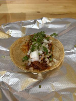 Barria taco on corn soft shell.