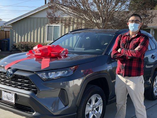 Congratulations Manuel on your new Toyota Rav4 Hybrid home delivery, curbside! Happy Holidays! and Cheers!