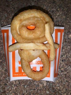 Raw batter on onion rings, and mushy French fries.