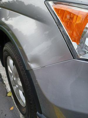 Fender damaged at Rock automotive in Kent Washington.