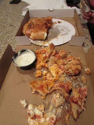 Buffalo chicken calzone- Ricotta cheese (??!!) and pizza sauce mixed in with buffalo sauce- not good!