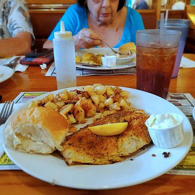 Broiled Cajun Haddock & side, Homefries with Raspberry Iced Tea