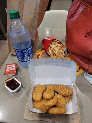 10 piece chicken nugget meal with bbq sauce, fries, and bottled water