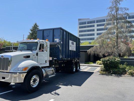 Delivering a 40 yard dumpster at a Commercial Job Site in Bellevue, WA