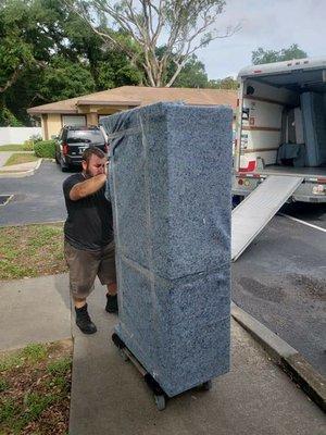 Padded dressered coming off the truck