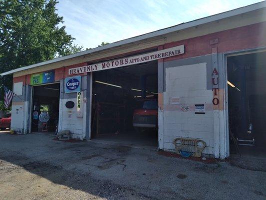 Used cars for sale, tire and repair shop.