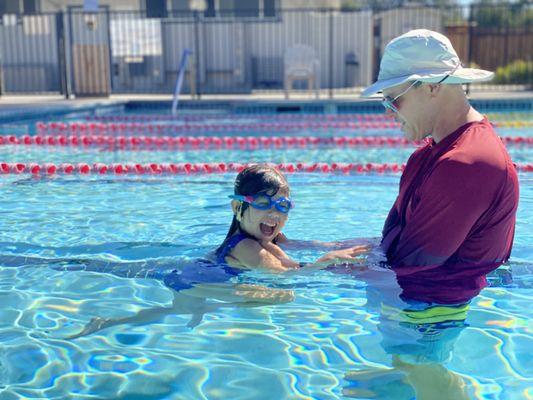 Coach Aaron with his swim student