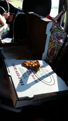 Pizza on the way home from the beach trip. Delicious.