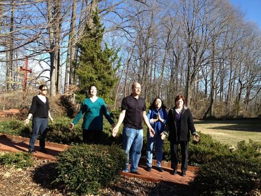 Reiki Healers grounding in the garden.