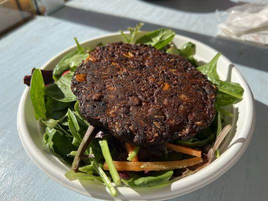 this was a custom-made salad with spinach, cucumbers, avocado, carrots, and radishes PLUS  a black bean chipotle burger that tasted amazing