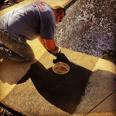 Mike working with concrete.