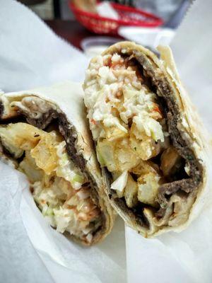 The Kof & Slaw: kofta kebab spread on a pita then fried. Then it is stuffed with french fries, pickles, coleslaw, ketchup and hot sauce