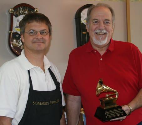 Justin fixed a Grammy for a customer.