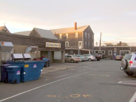 The parking lot, specifically for Reliable Market shopping.