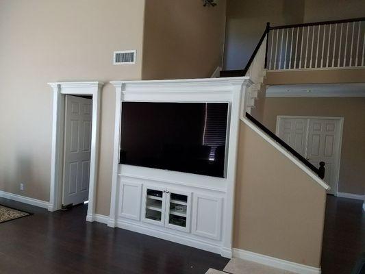 Custom Built-in under the stair Entertainment center. Convert your existing under stair dead space into beautiful cabinetry/storage.