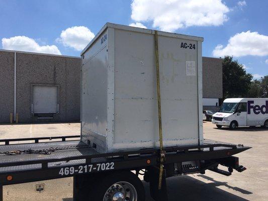 Pro football player storage container with all his equipment so he can teach at the high schools in off season