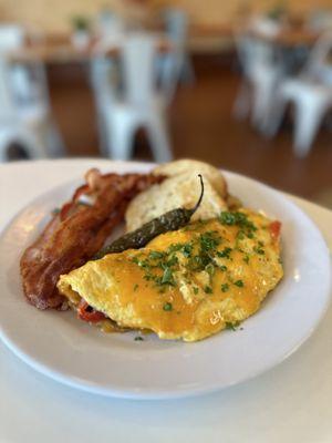 Omelet served with Toasted Sourdough and a double side of bacon.