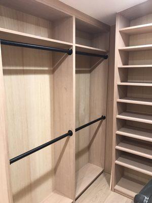 Walk in closet white oak built by JR Builders.