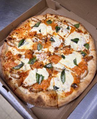 Drunk Chicken Pizza- Crispy Chicken, Homemade Vodka Sauce & Fresh Mozzarella topped with Parmesan and Basil