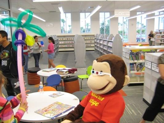 Curious George loves balloon animals