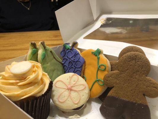 Creamsicle Cupcake, frosted cut-outs, Gingerbread boys w/ choc pants and raspberry sandwich cookie...  all SO YUMM!