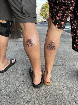 Big brother and little sister matching tattoos.