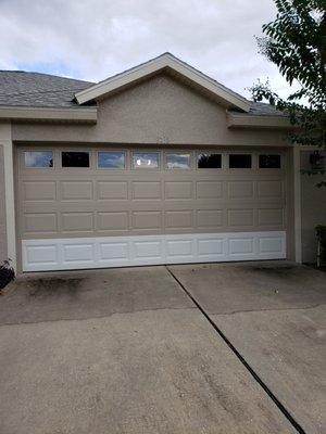 New lower garage door panel.