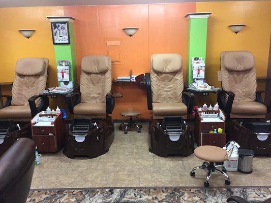 Four spa massage chairs