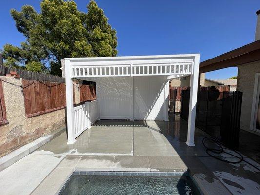 Gazebo style full covered with pickets on top and privacy wall,and railing on the side