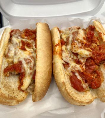 Veal Parm with provolone, marinara sauce, and veal cutlet.