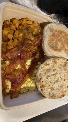 Scrambled eggs with bacon and potatoes