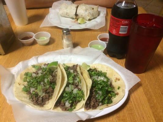 Carne asada tacos and a lengua burrito. So good