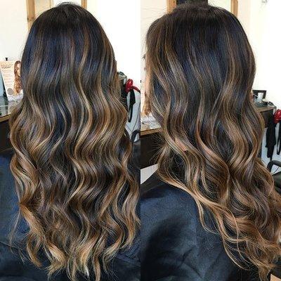 Beautiful balayage service on long hair with waves