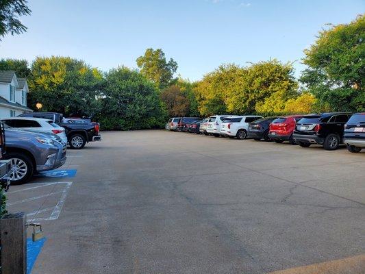 Partial view of next door parking lot. Street parking close by