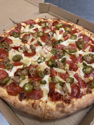 Large with pepperoni, sausage, pineapple, and jalapeño