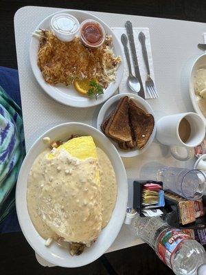 Awesome Omelet, hash browns on side with toast.