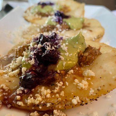 Pork tacos with avocado & blueberry mash