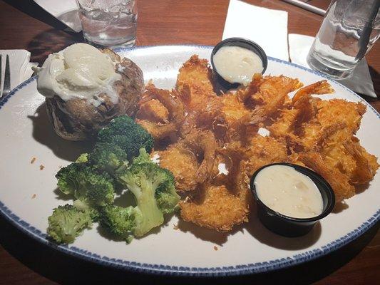 Coconut shrimp dinner with broccoli and Baked Potato