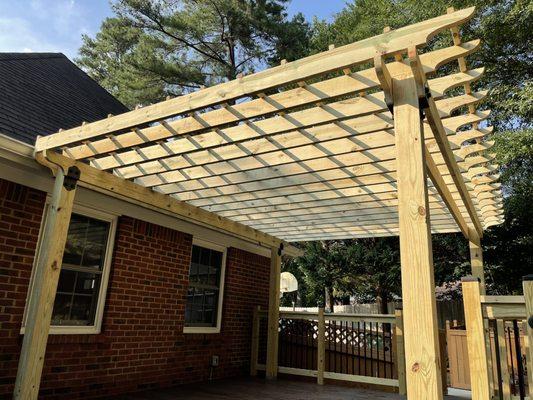 Deck and pergola build by Neighborhood Lawn Care and landscaping