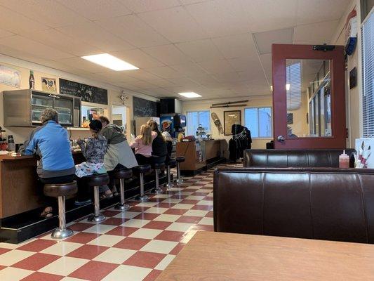 Sitting down inside....classic diner setting with a real homely ambiance.