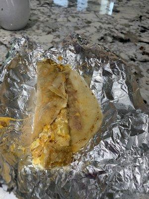 Potato and Eggs Taco Breakfast - added refried beans and cheese -  Solid but it  needed some seasoning