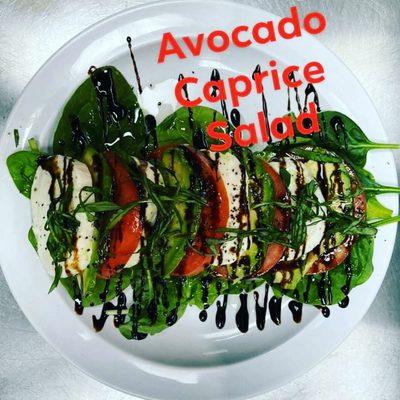 Avocado, tomatoes, fresh mozzarella, bed of spinach and drizzle with balsamic and fresh basil.