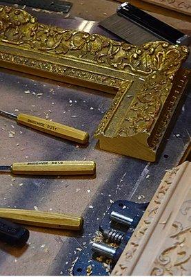 Carving and gilding to replicate hand-crafted frame.